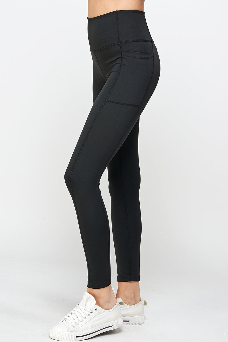 Black stretch leggings with side pockets