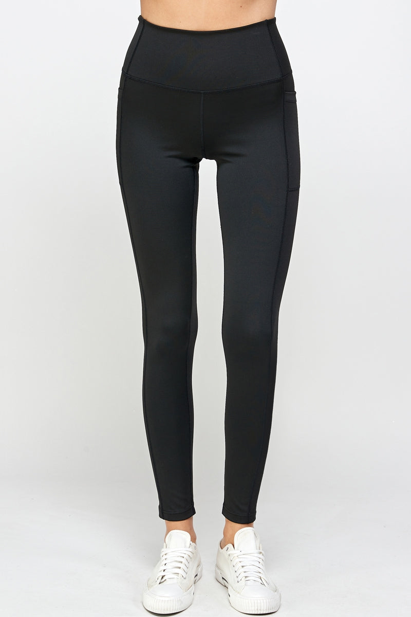 Black stretch leggings with side pockets