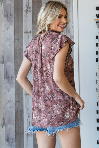 Woven Rayon Floral Smocked Neck Flutter Sleeve Top With Back Button Closure in Wine