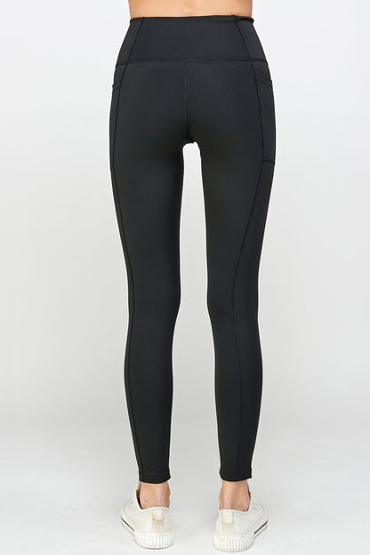 Black stretch leggings with side pockets